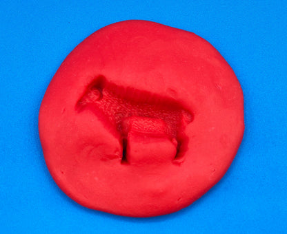 animal impression in playdough